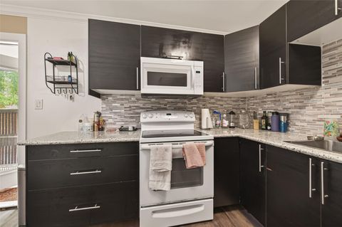 Photo of 3934 W Alabama Street #4, Houston, TX 77027 (MLS # 21725578)