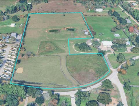 Photo of 0 Hufsmith Rd, Tomball, TX 77375 (MLS # 94411570)