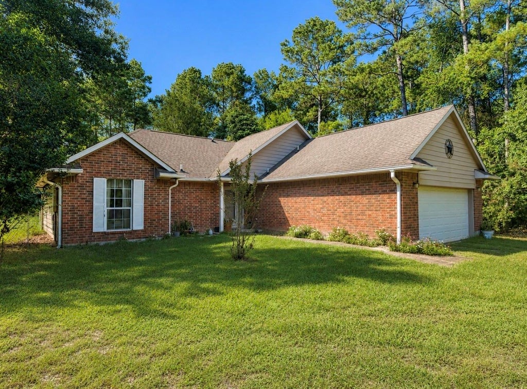 Photo of 612 Milner Road, Livingston, TX 77351 (MLS # 84164716)