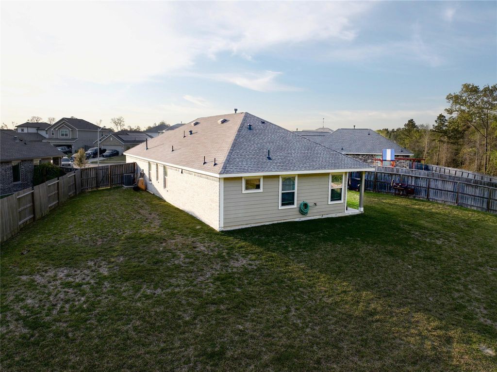 Photo of 19409 Rosali Meadow Drive, New Caney, TX 77357 (MLS # 37854238)