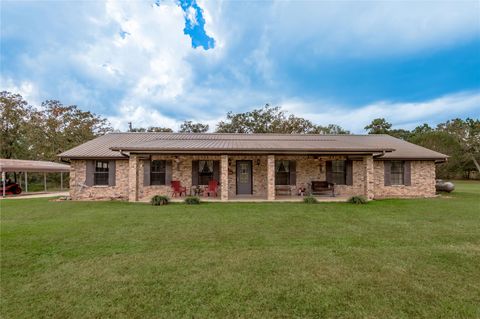 Photo of 206 William Thomas Road, Huntsville, TX 77320 (MLS # 28869034)