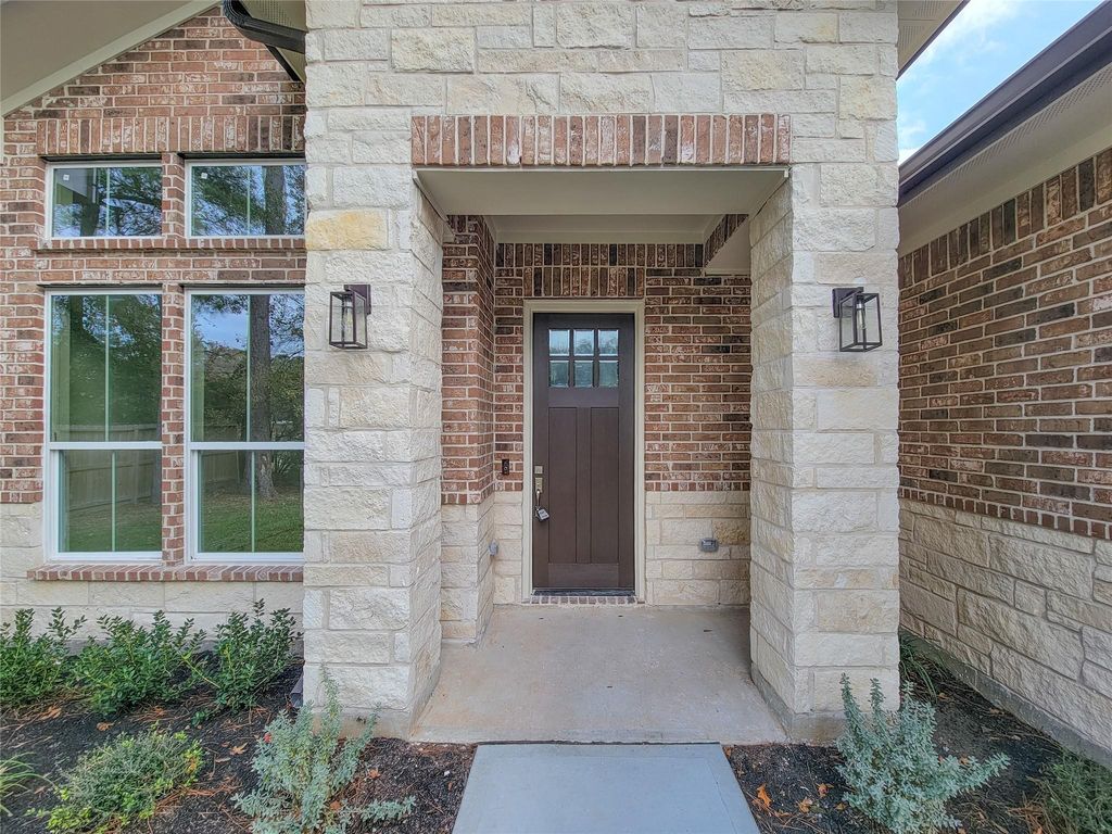 Photo of 10308 Lakewood Drive, Conroe, TX 77385 (MLS # 24749148)