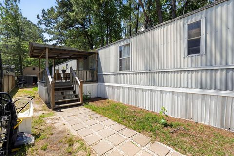 Photo of 12915 Pineshadows Street #39, Pinehurst, TX 77362 (MLS # 22927080)