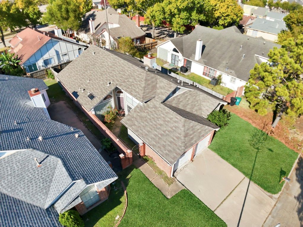 Photo of 9306 Corner Oaks Lane, Houston, TX 77036 (MLS # 92283595)