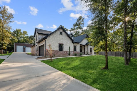Photo of 19691 Village Forest Drive Dr, Montgomery, TX 77356 (MLS # 70074560)