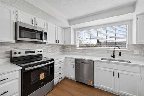 Photo of 10102 Old Towne Lane, Sugar Land, TX 77498 (MLS # 10797946)