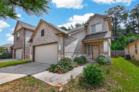 Photo of 4314 Mcgregor Bluff Lane, Conroe, TX 77304 (MLS # 61223722)