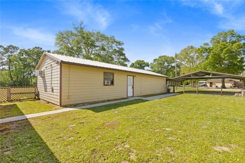 Photo of 22360 Highway 321, Cleveland, TX 77327 (MLS # 34685178)