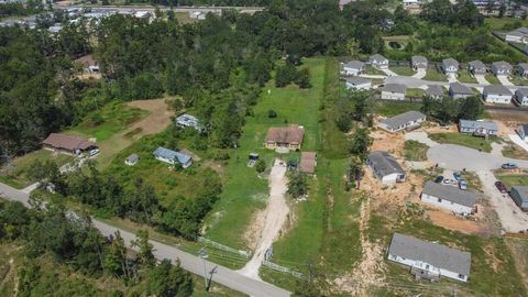 Photo of 17383 Old Highway 105 E, Conroe, TX 77306 (MLS # 81433392)