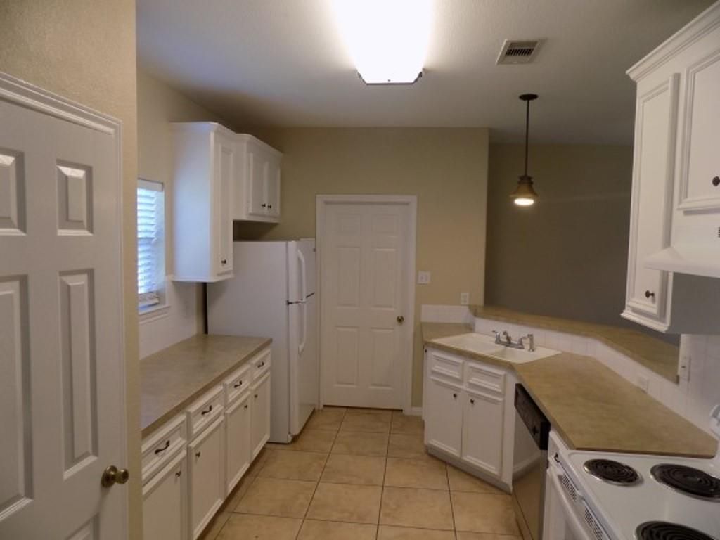 Photo of 13541 Lake Breeze Lane, Willis, TX 77318 (MLS # 73593706)