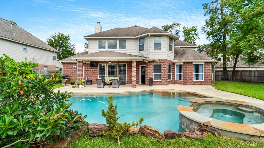 Photo of 14114 Tealstone Falls Court, Houston, TX 77044 (MLS # 81612833)