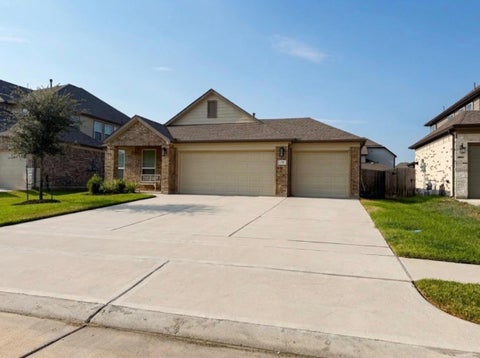 Photo of 301 E Tranquil Fields Lane, Waller, TX 77484 (MLS # 98828764)