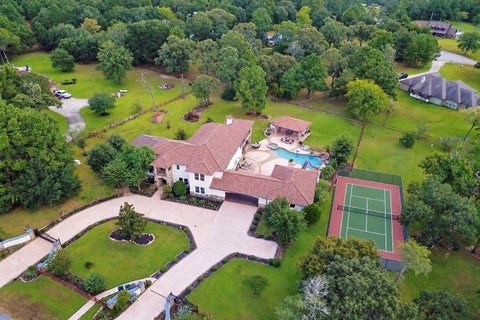 Photo of 20 Lakefield Boulevard, Magnolia, TX 77355 (MLS # 67866761)