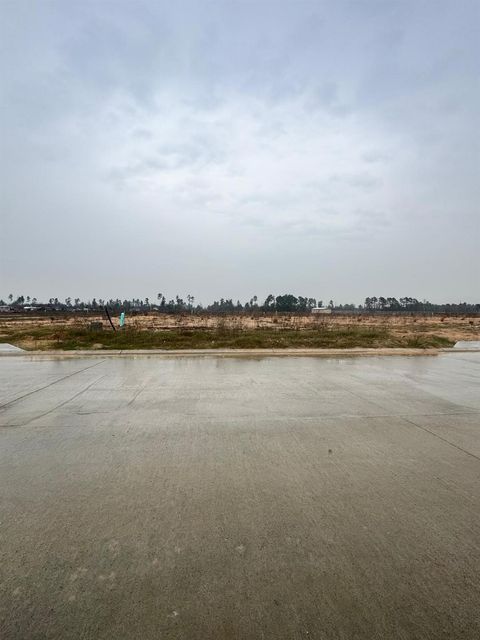 Photo of 205 Road 592006, Cleveland, TX 77327 (MLS # 98461687)