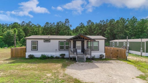 Photo of 12576 Stablegate Drive, Conroe, TX 77306 (MLS # 66952923)