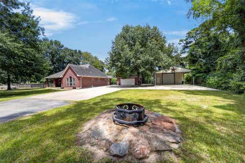 Photo of 822 Sentinel Oaks, Pinehurst, TX 77362 (MLS # 69522714)