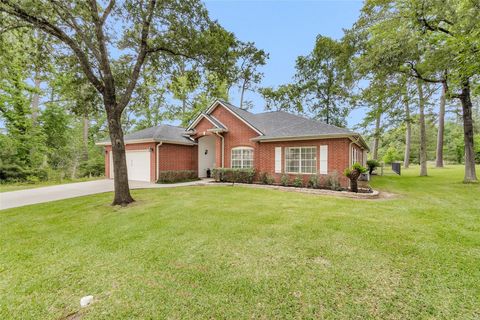 Photo of 12031 Maverick Drive, Willis, TX 77378 (MLS # 27633403)