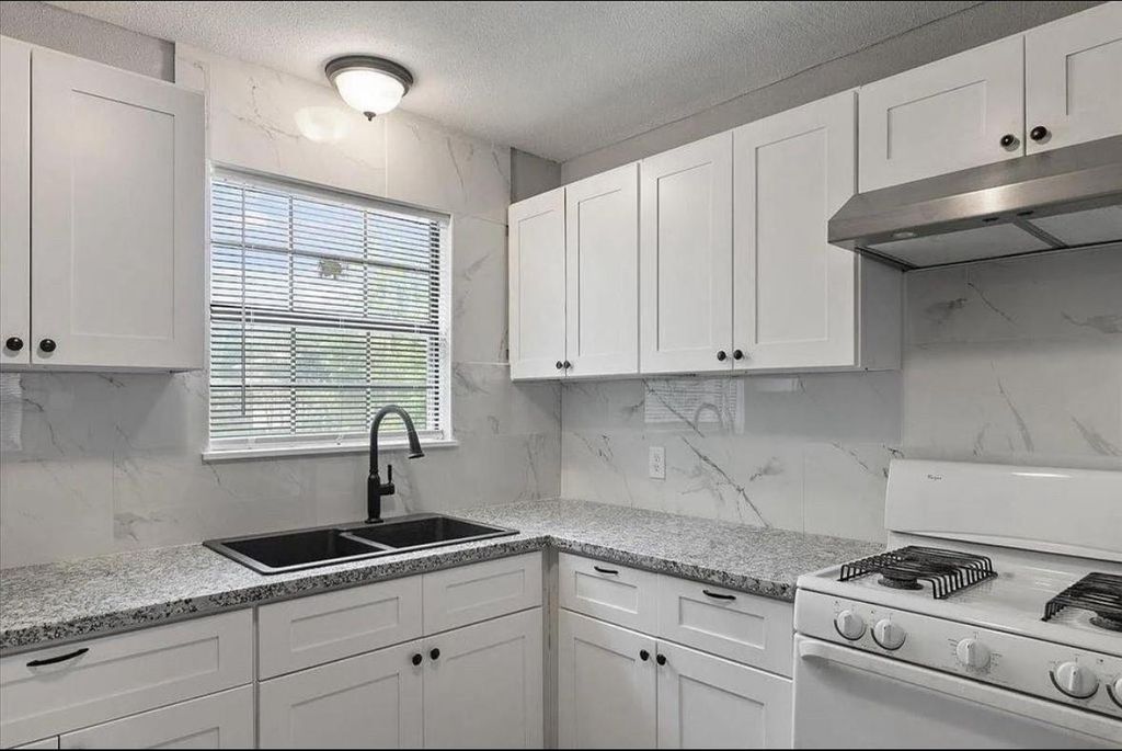 Photo of 9033 Oak Knoll Lane, Houston, TX 77078 (MLS # 69563186)