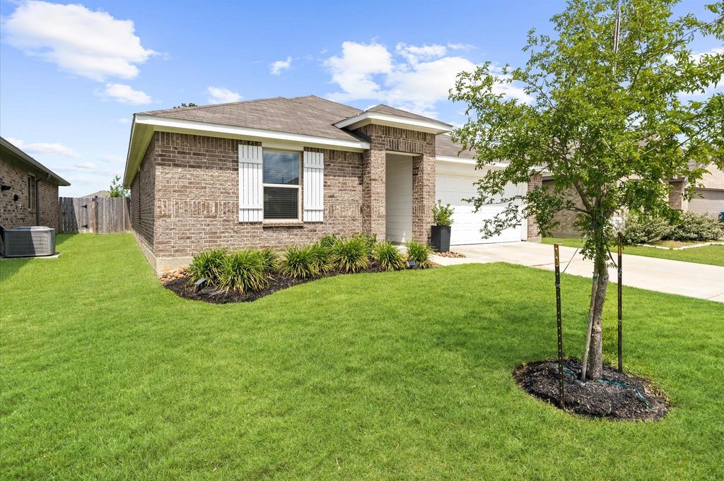 Photo of 20314 Tembec Drive, New Caney, TX 77357 (MLS # 91109690)