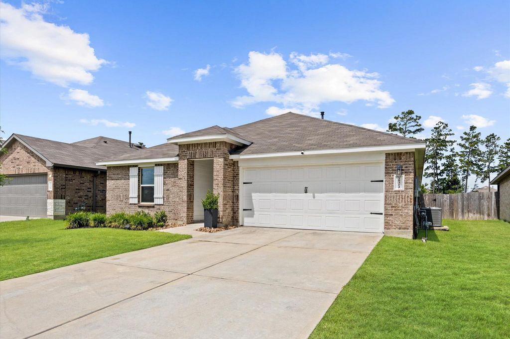 Photo of 20314 Tembec Drive, New Caney, TX 77357 (MLS # 91109690)