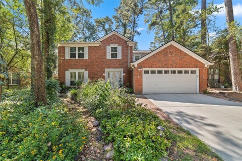 Photo of 218 E Rainbow Ridge Circle, The Woodlands, TX 77381 (MLS # 62092191)