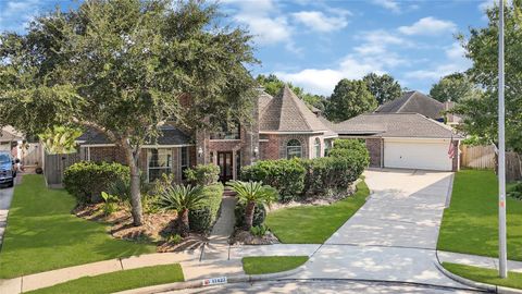 Photo of 17427 Pinecreek Hollow Lane, Houston, TX 77095 (MLS # 39290524)