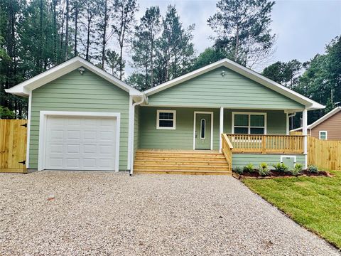 Photo of 20 Pine Trail, Oakhurst, TX 77359 (MLS # 68461533)