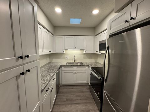 Photo of 2700 Bellefontaine Street #A24, Houston, TX 77025 (MLS # 97216496)