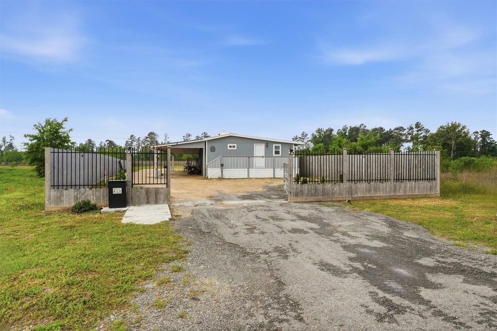 Photo of 1114 Road 5601, Cleveland, TX 77327 (MLS # 95873267)