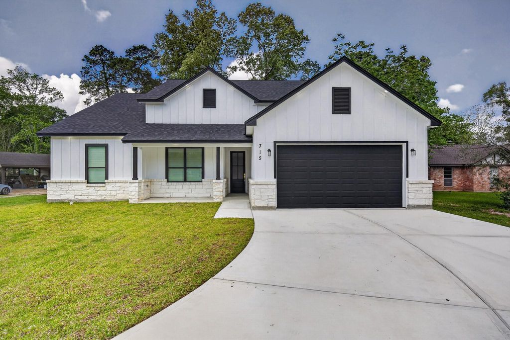 Photo of 315 Autumn Oak Street, New Caney, TX 77357 (MLS # 64706449)