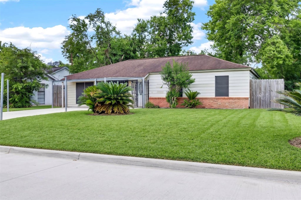 Photo of 9211 Clearway Drive, Houston, TX 77033 (MLS # 63806849)