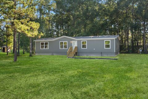 Photo of 3941 Highline Oaks W, Conroe, TX 77306 (MLS # 96619589)