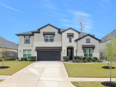 Photo of 1067 Lakemont Bend Lane, Pinehurst, TX 77362 (MLS # 86354745)