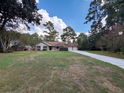 Photo of 1119 Coe Road, Pinehurst, TX 77362 (MLS # 72338087)