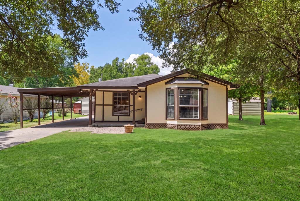 Photo of 221 Oak Ridge Drive, Onalaska, TX 77360 (MLS # 68226769)