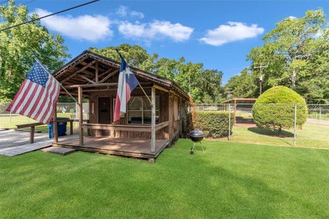 Photo of 15734 Holly Dr, Montgomery, TX 77356 (MLS # 62983442)