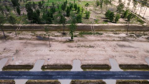 Photo of 18265 Bunsen Drive Dr, Conroe, TX 77306 (MLS # 98447715)