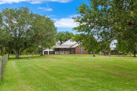 Photo of 7460 Commander Roland Drive, Hitchcock, TX 77563 (MLS # 21051439)