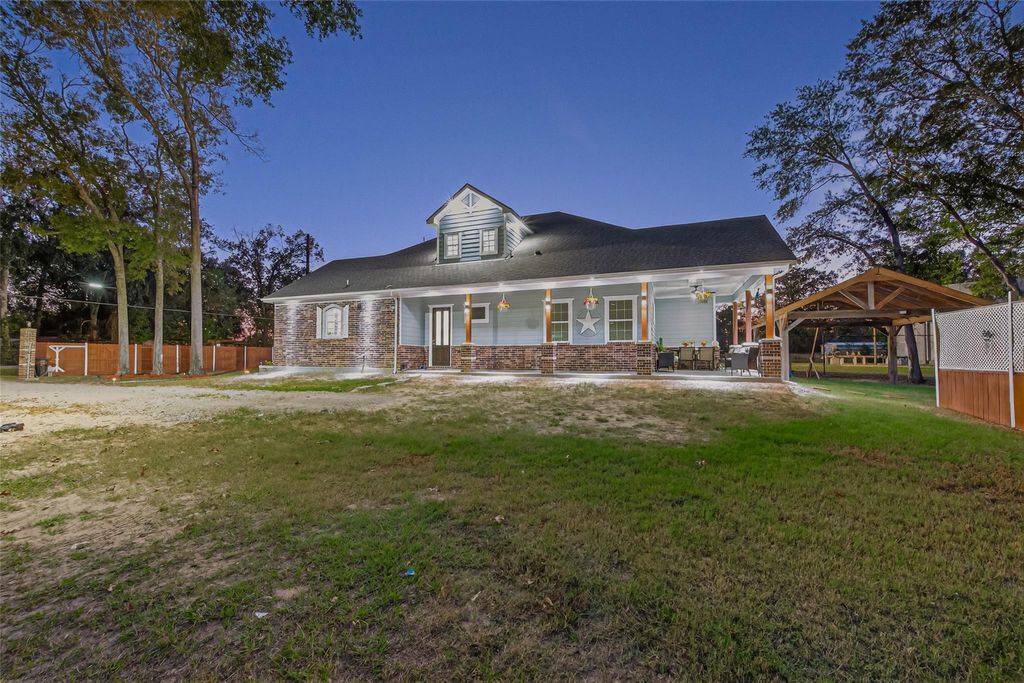Photo of 22553 Lawsuit Lane, New Caney, TX 77357 (MLS # 35332537)