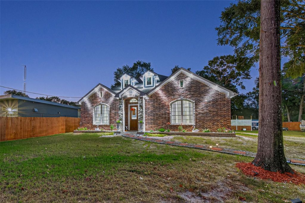 Photo of 22553 Lawsuit Lane, New Caney, TX 77357 (MLS # 35332537)