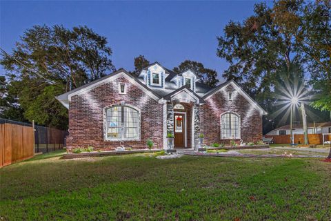 Photo of 22553 Lawsuit Lane, New Caney, TX 77357 (MLS # 35332537)