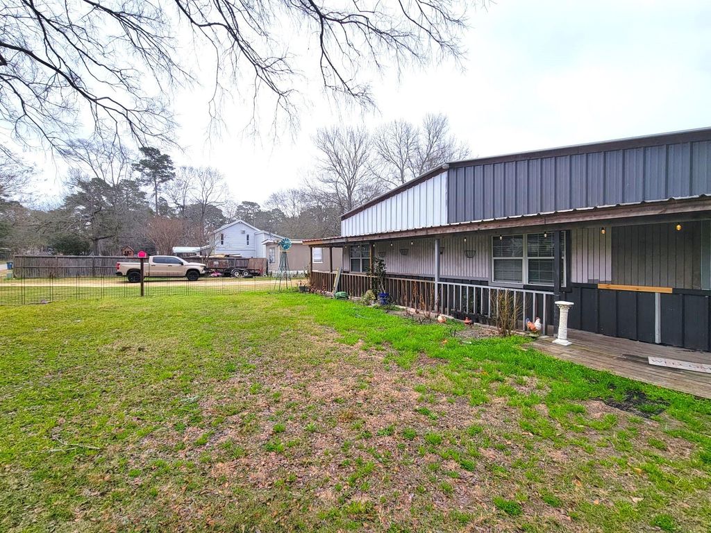 Photo of 20724 Brazos Drive, New Caney, TX 77357 (MLS # 97672271)