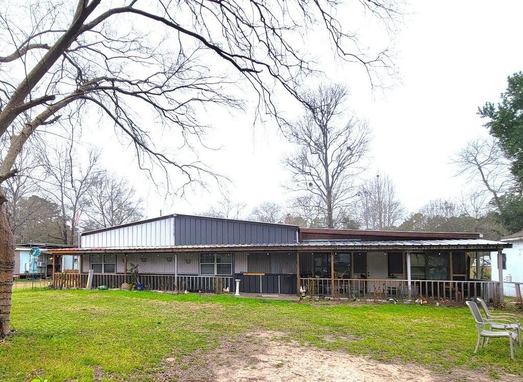 Photo of 20724 Brazos Drive, New Caney, TX 77357 (MLS # 97672271)