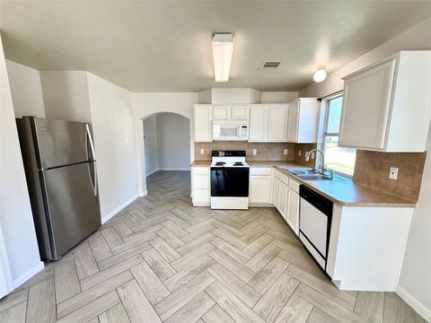 Photo of 10811 Tallow Briar, Houston, TX 77075 (MLS # 72364556)