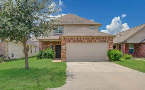 Photo of 10335 Solitude Way, Houston, TX 77044 (MLS # 75539079)