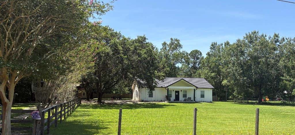 Photo of 99 Hickory Ridge Drive #D, Huffman, TX 77336 (MLS # 94035621)
