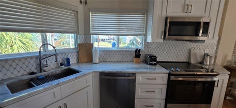 Tiny photo for 1702 E Castaway Street, Tiki Island, TX 77554 (MLS # 58166871)