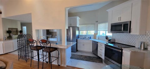 Tiny photo for 1702 E Castaway Street, Tiki Island, TX 77554 (MLS # 58166871)