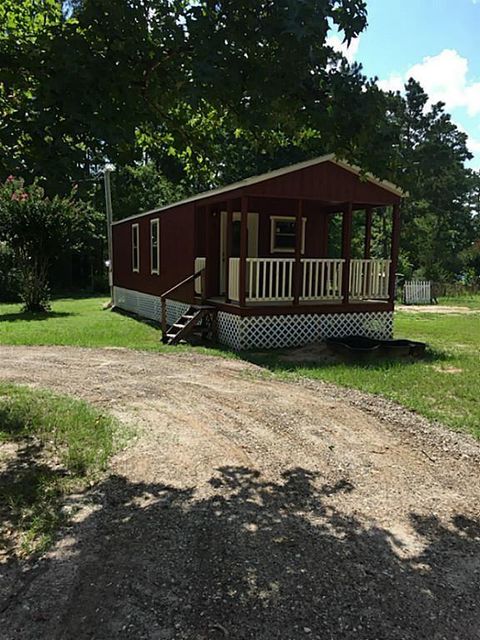 Photo of 15 Starlite Drive, Huntsville, TX 77320 (MLS # 64146432)