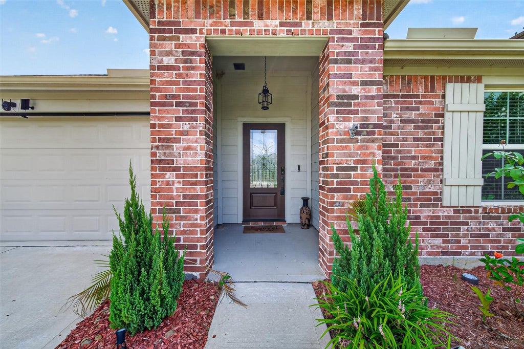 Photo of 14319 Rain Drive, New Caney, TX 77357 (MLS # 63438881)